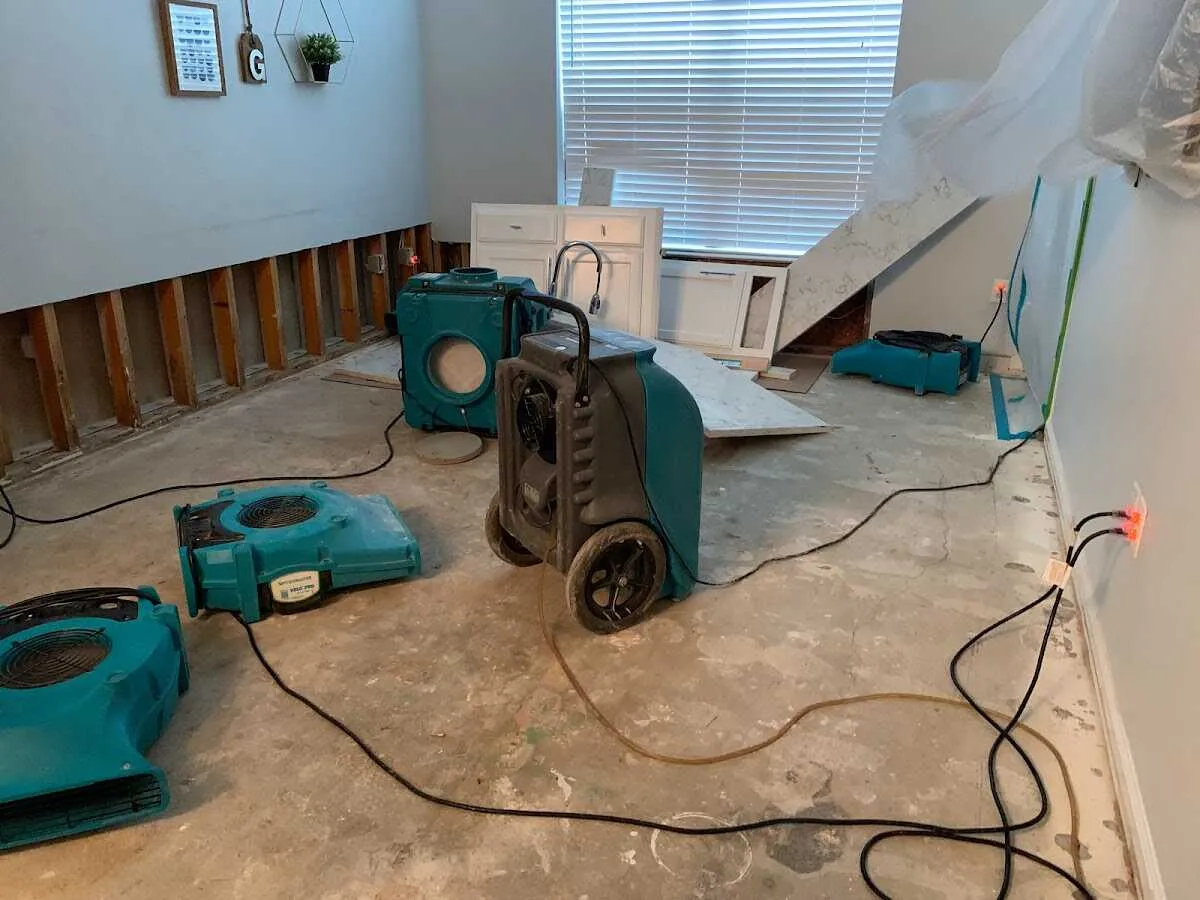 Dehumidifier in flood-cut room for Water Damage Restoration in Roswell